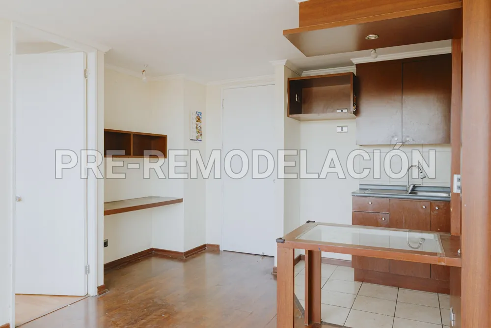 Cocina abierta al living, departamento Av. Vicuña Mackenna 881