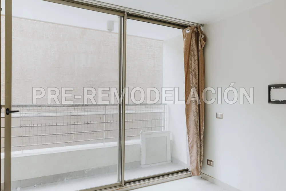 Dormitorio con ventanal a la terraza, departamento Morandé 626