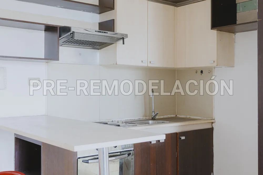 Cocina con campana y encimera, departamento Nataniel Cox 599