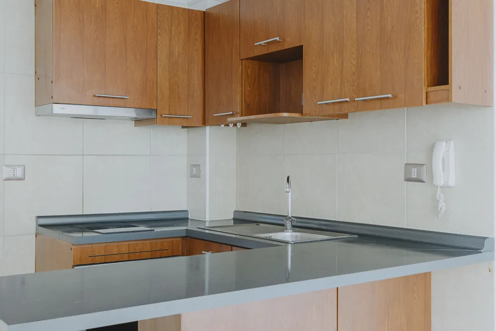 Cocina con lavaplatos y encimera, departamento San Francisco 265