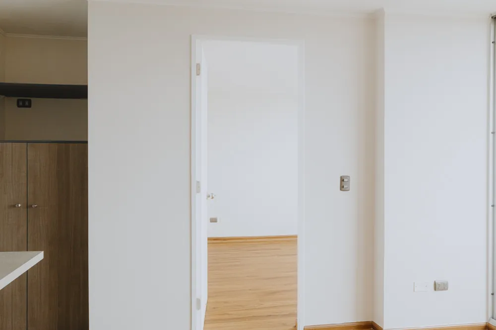 Acceso al dormitorio, departamento Vicuña Mackenna 2585
