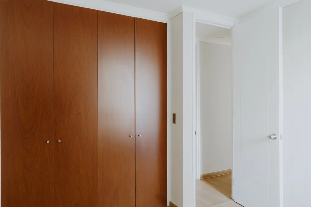 Clóset del dormitorio, departamento Av. Vicuña Mackenna 881